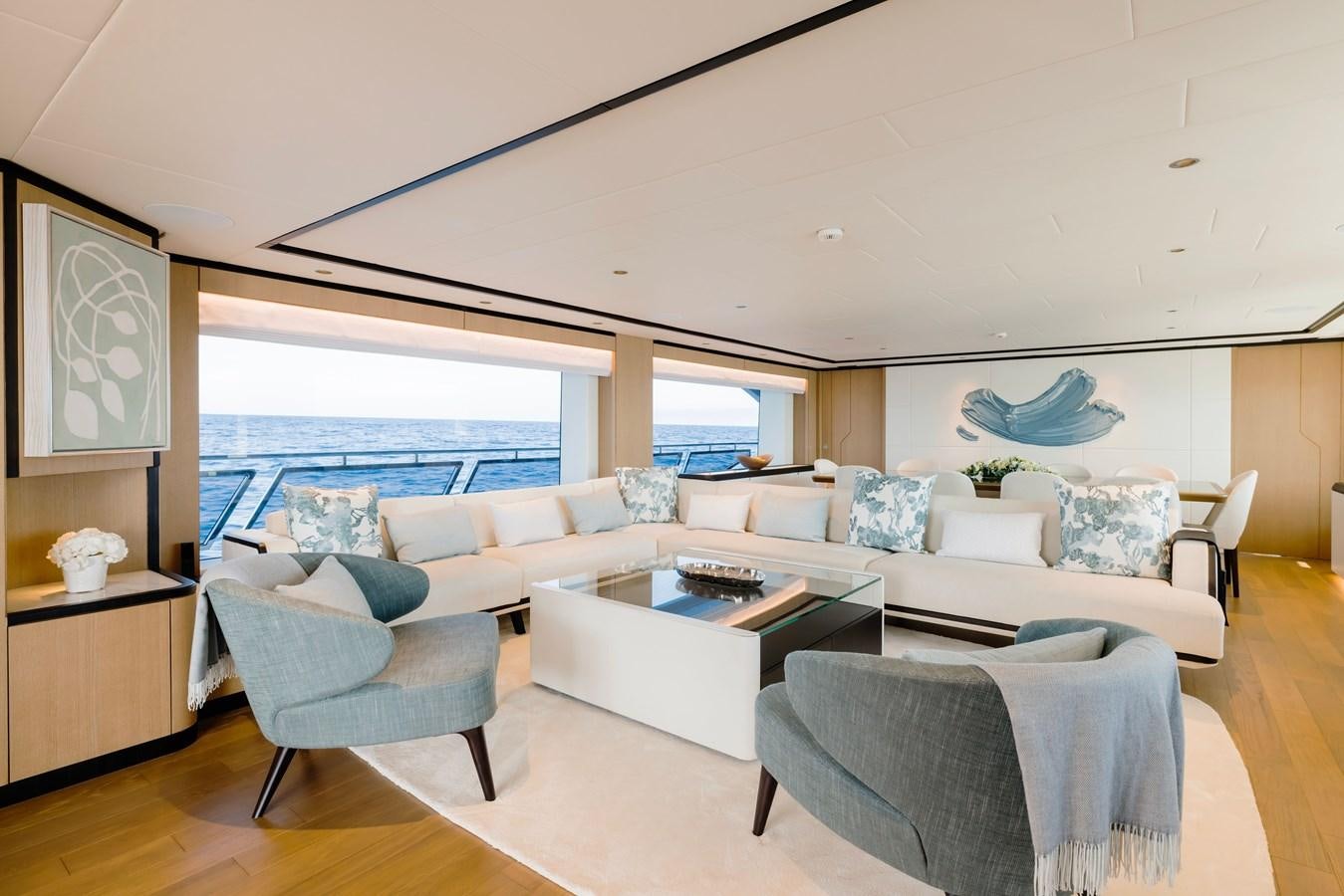 a living room with a large window aboard MAJESTY 111 Yacht for Sale