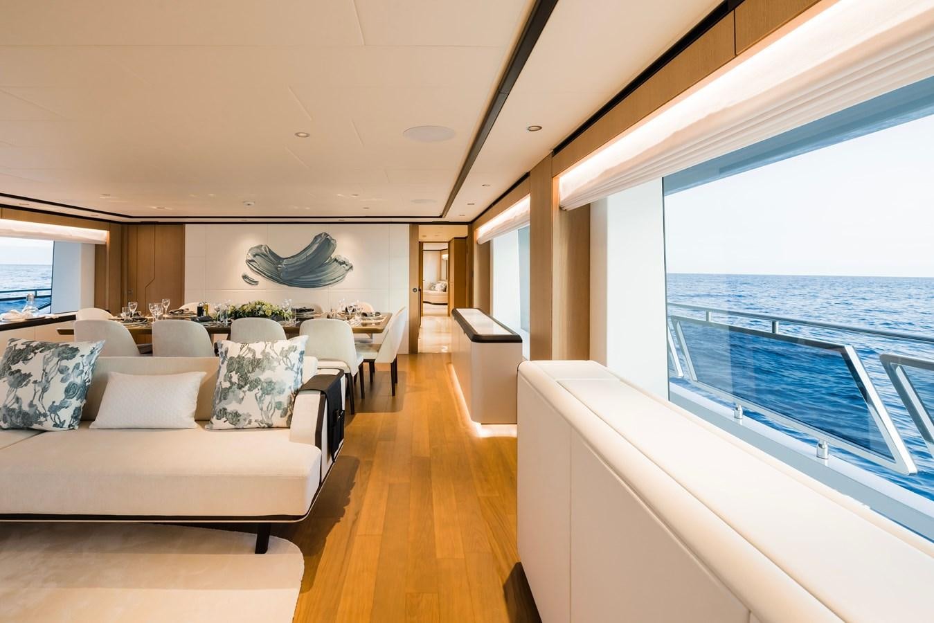 a large room with a bed and a large window aboard MAJESTY 111 Yacht for Sale