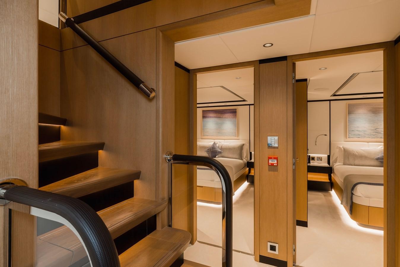 a room with a bed and a desk aboard MAJESTY 111 Yacht for Sale