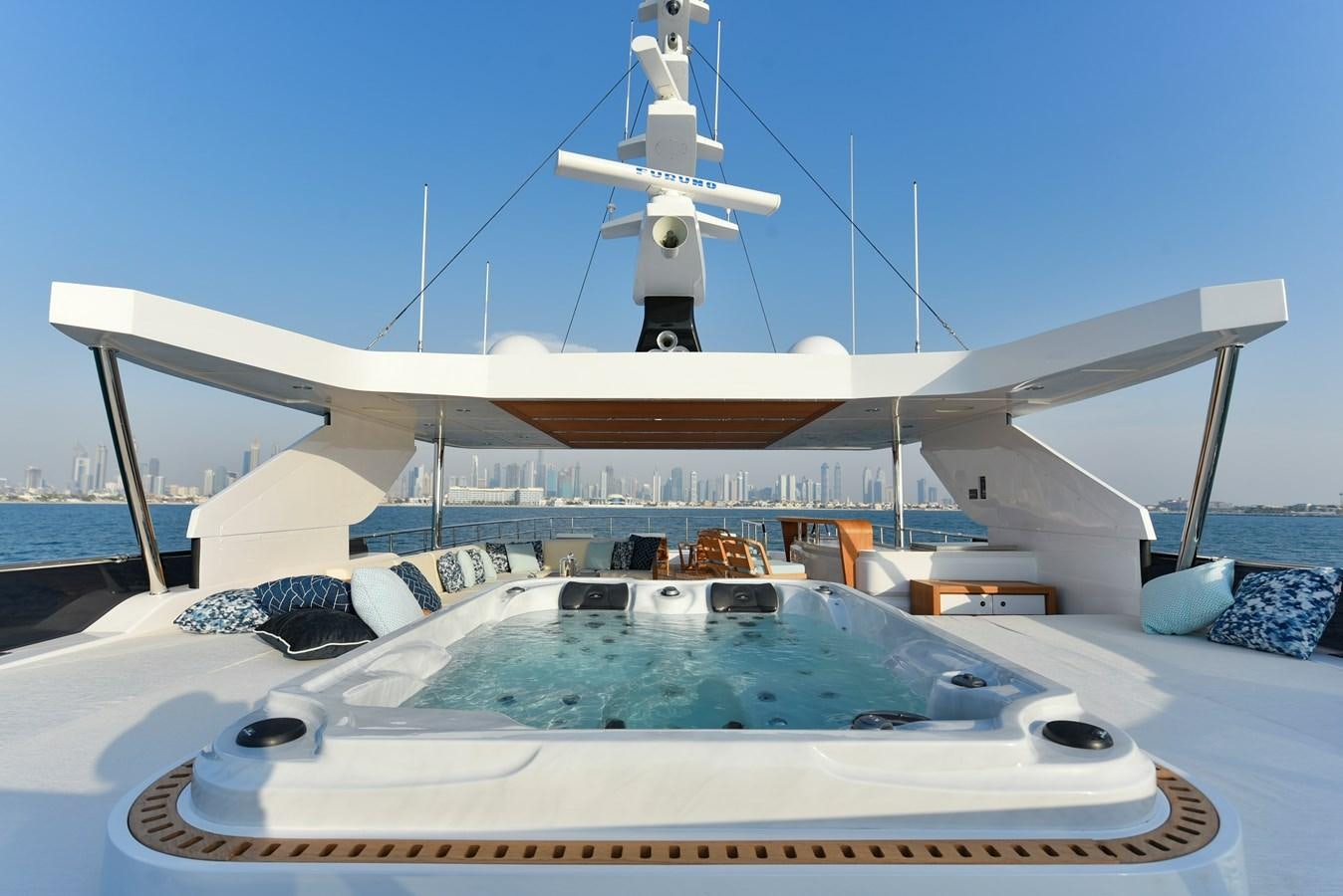 a large white building with a dome roof and a white dome on top aboard MAJESTY 111 Yacht for Sale