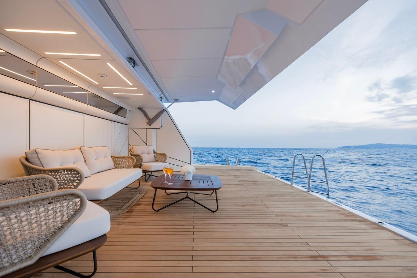 a large living room with a large body of water aboard MAJESTY 111 Yacht for Sale