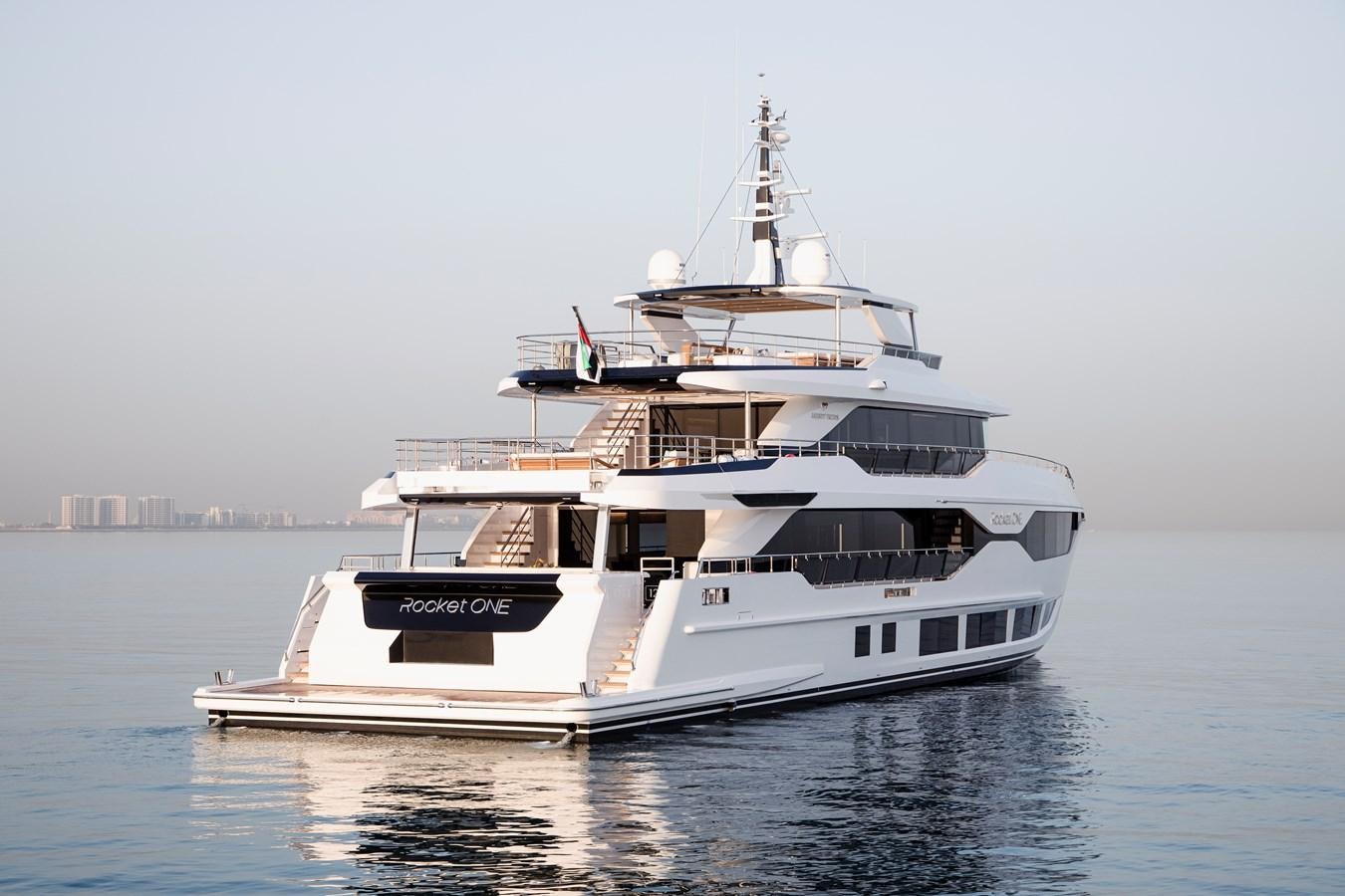 a large white boat in the water aboard MAJESTY 111 Yacht for Sale