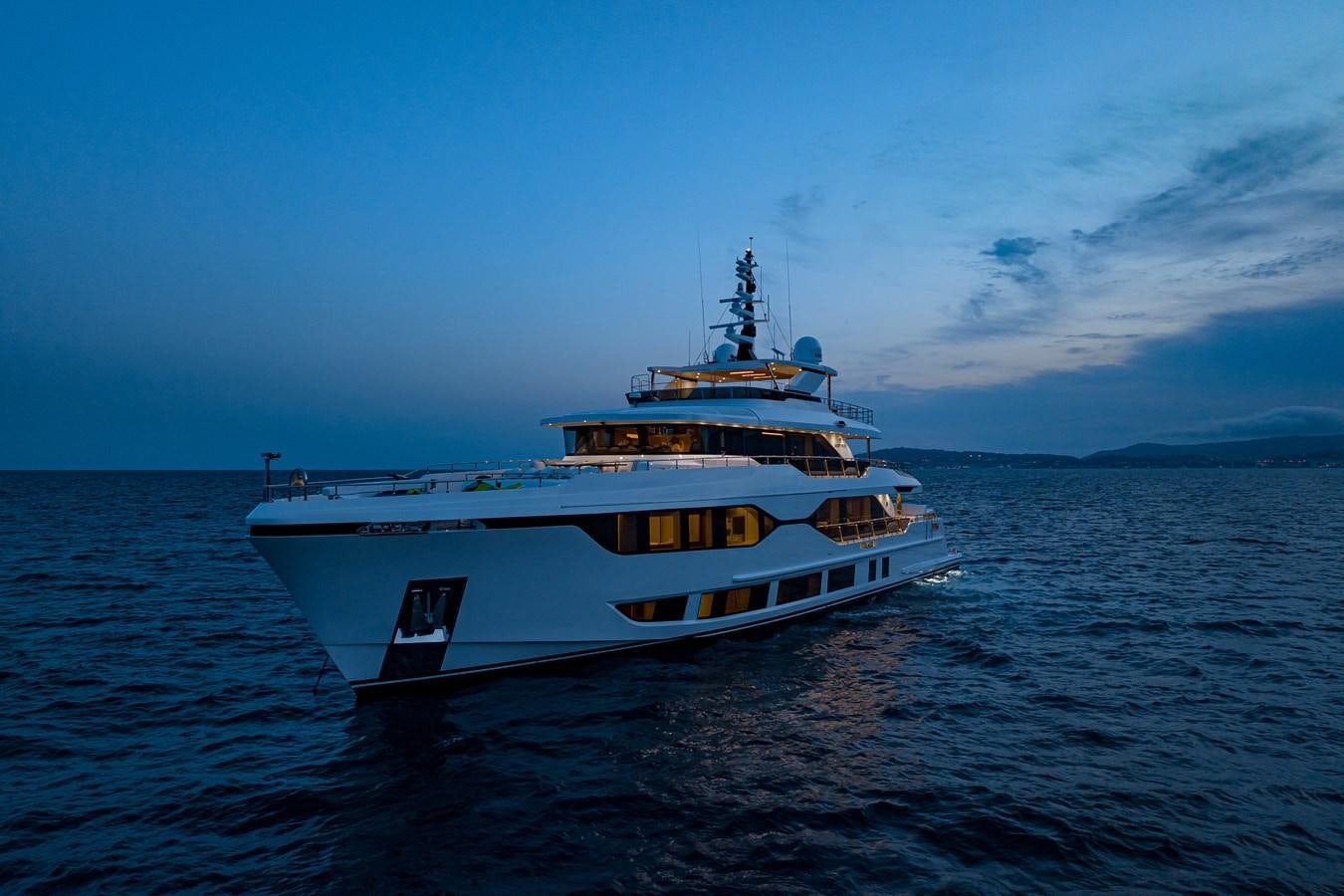 a large white boat in the water aboard MAJESTY 111 Yacht for Sale