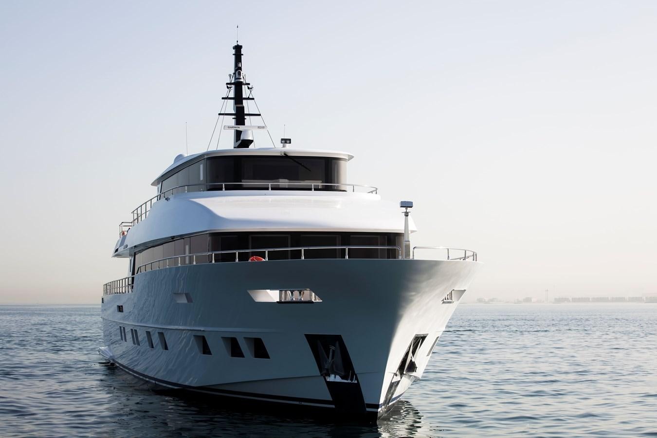 a large boat in the water aboard NOMAD 95 SUV Yacht for Sale