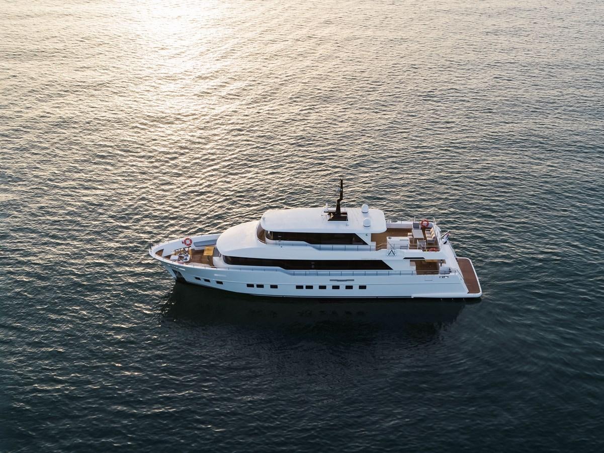 a boat on the water aboard NOMAD 95 SUV Yacht for Sale