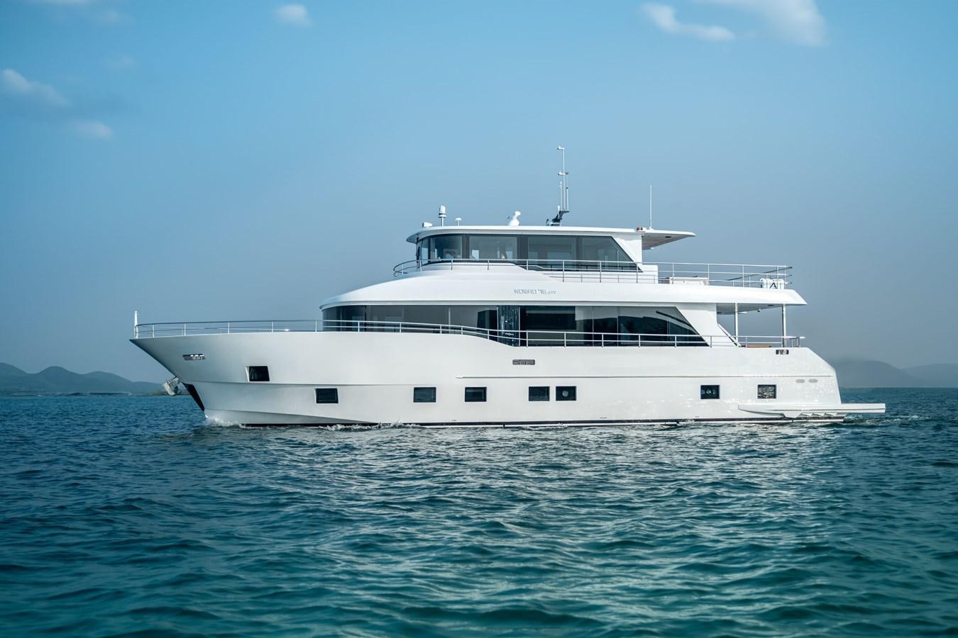 a white boat in the water aboard #4 NOMAD 75 SUV Yacht for Sale