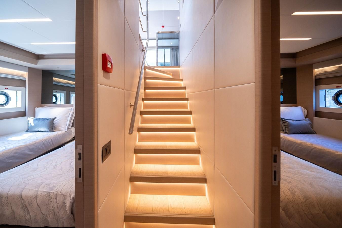 a staircase in a room aboard #4 NOMAD 75 SUV Yacht for Sale