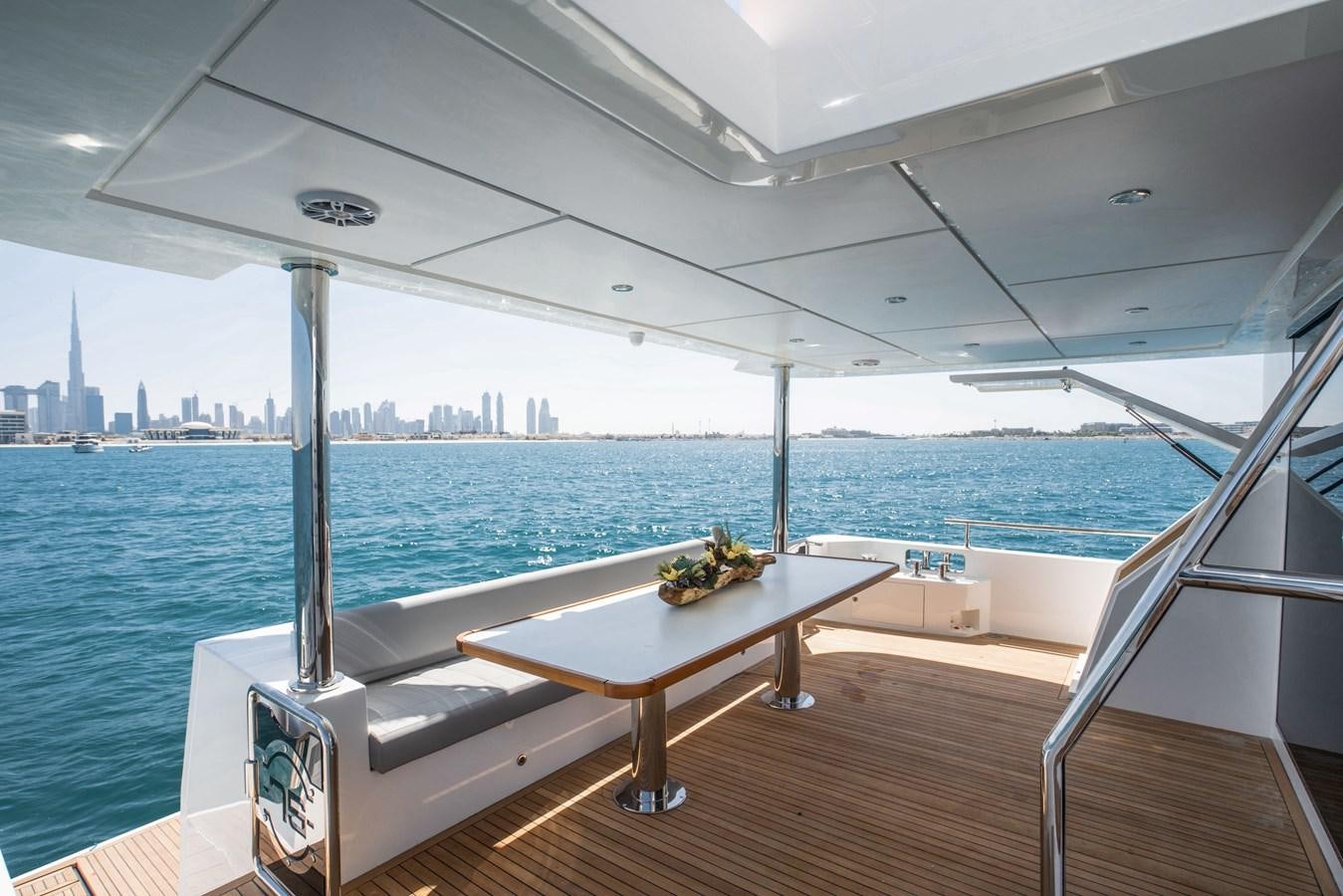 a table on a boat aboard #4 NOMAD 75 SUV Yacht for Sale