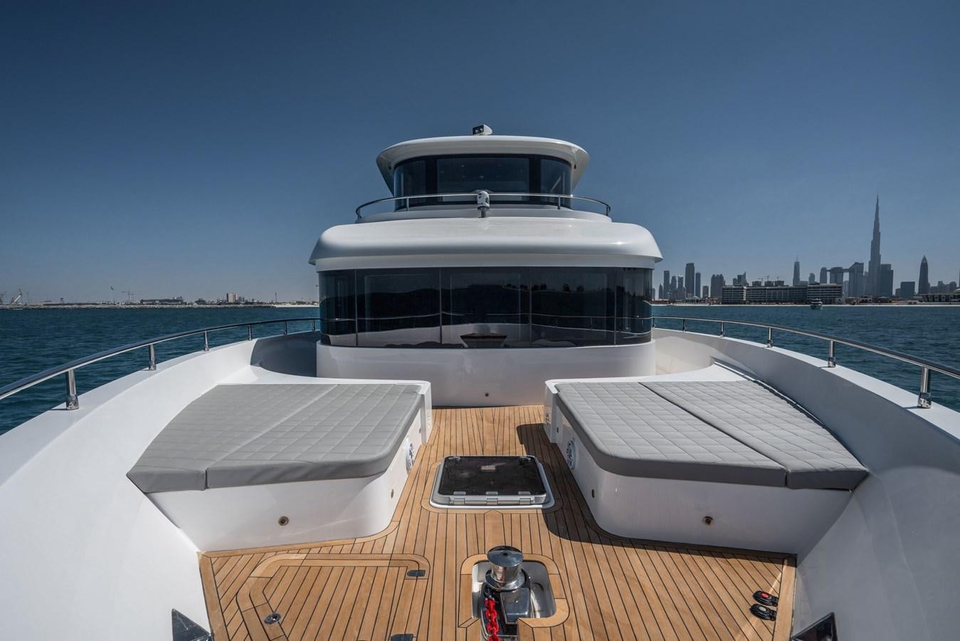 a boat on a deck with Camera Obscura in the background aboard #4 NOMAD 75 SUV Yacht for Sale