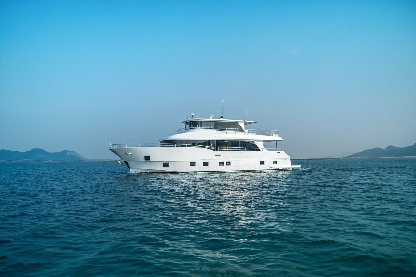 a white boat in the water aboard #4 NOMAD 75 SUV Yacht for Sale
