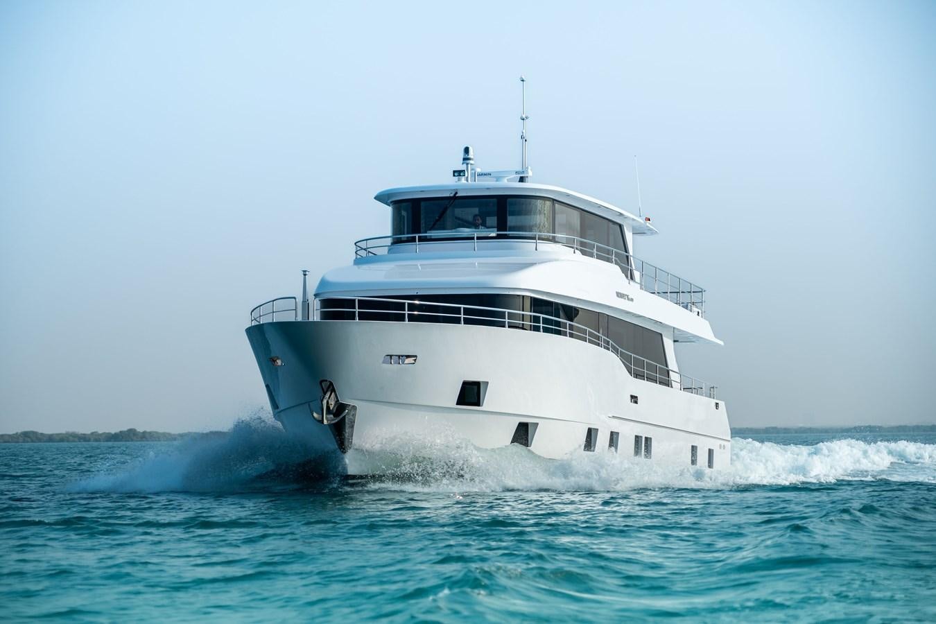 a large white boat in the ocean aboard #4 NOMAD 75 SUV Yacht for Sale