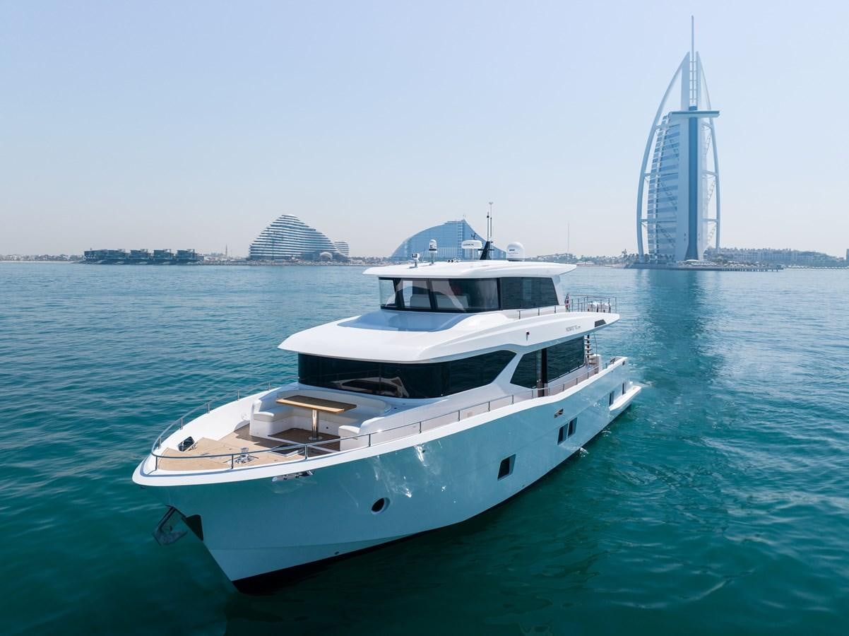 a boat in the water aboard NOMAD 70 SUV Yacht for Sale