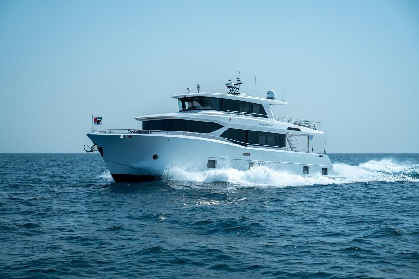 a boat on the water aboard NOMAD 70 SUV Yacht for Sale