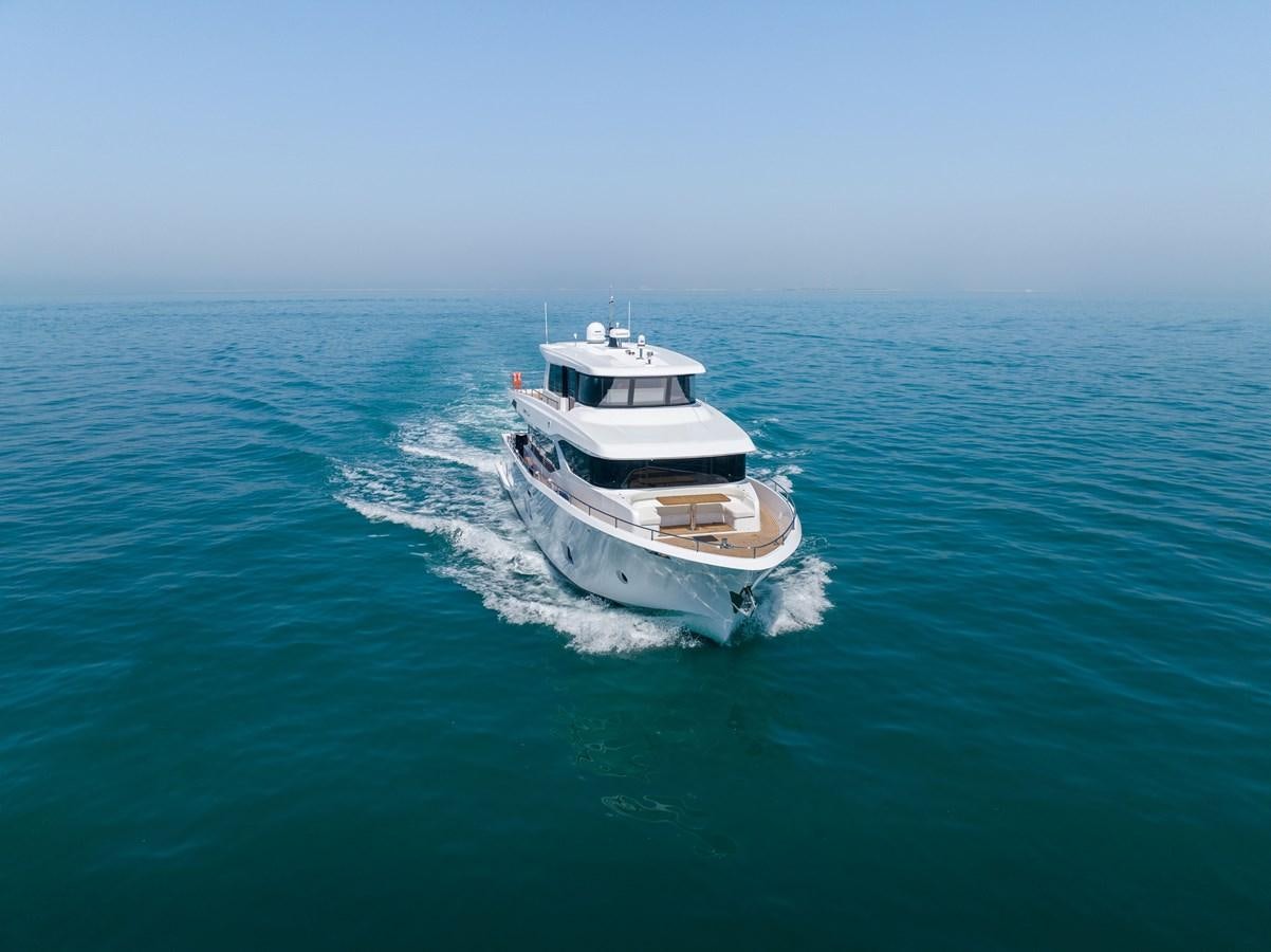 two boats on the water aboard NOMAD 70 SUV Yacht for Sale