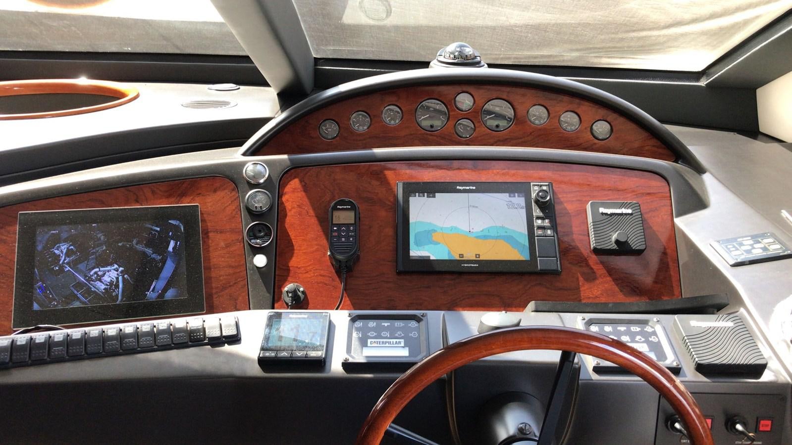 the inside of a car aboard MYA Yacht for Sale