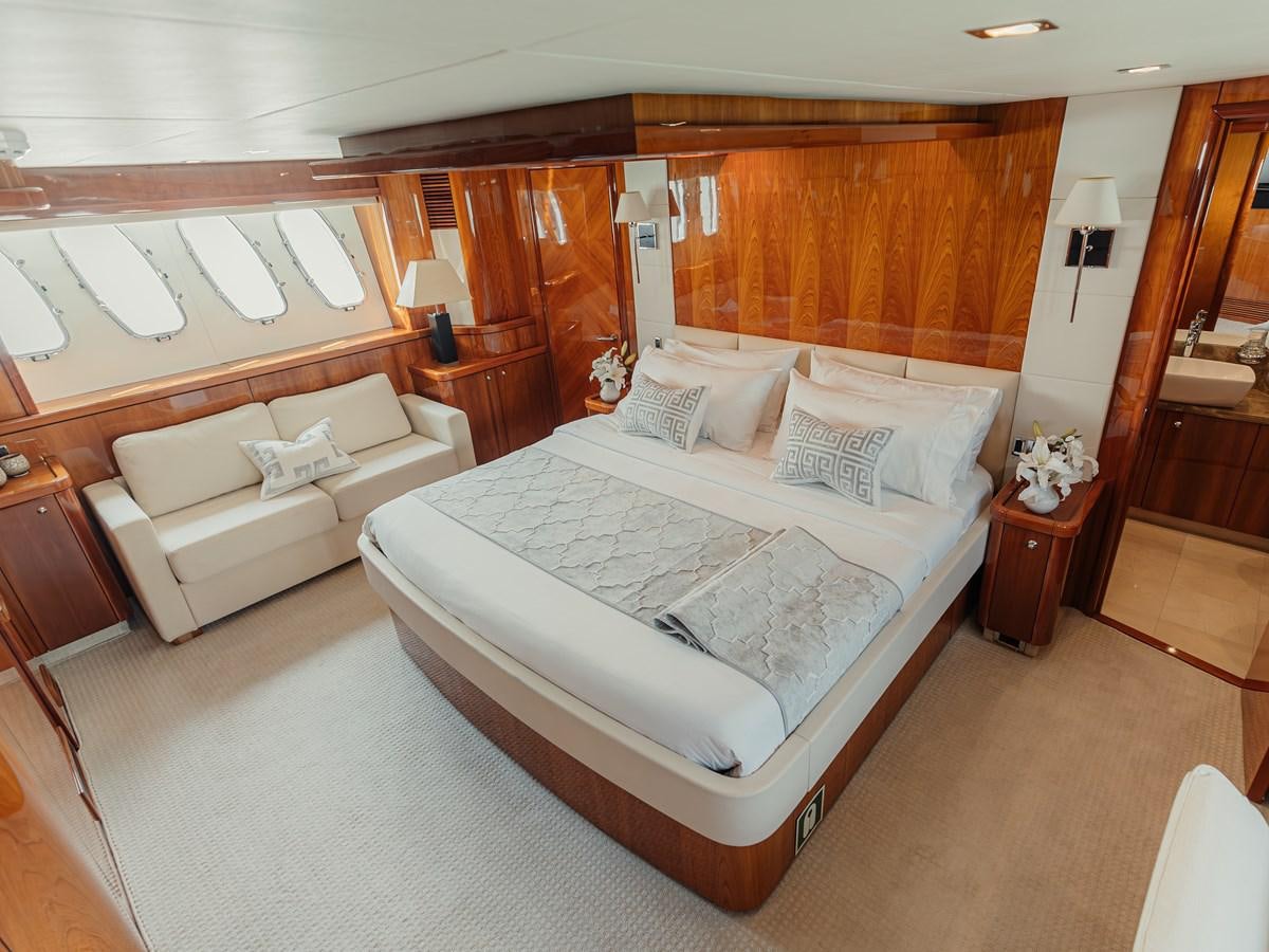 a bed in a room aboard AARNA Yacht for Sale