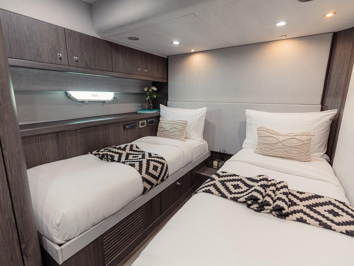 a room with two beds aboard MATRIX Yacht for Sale
