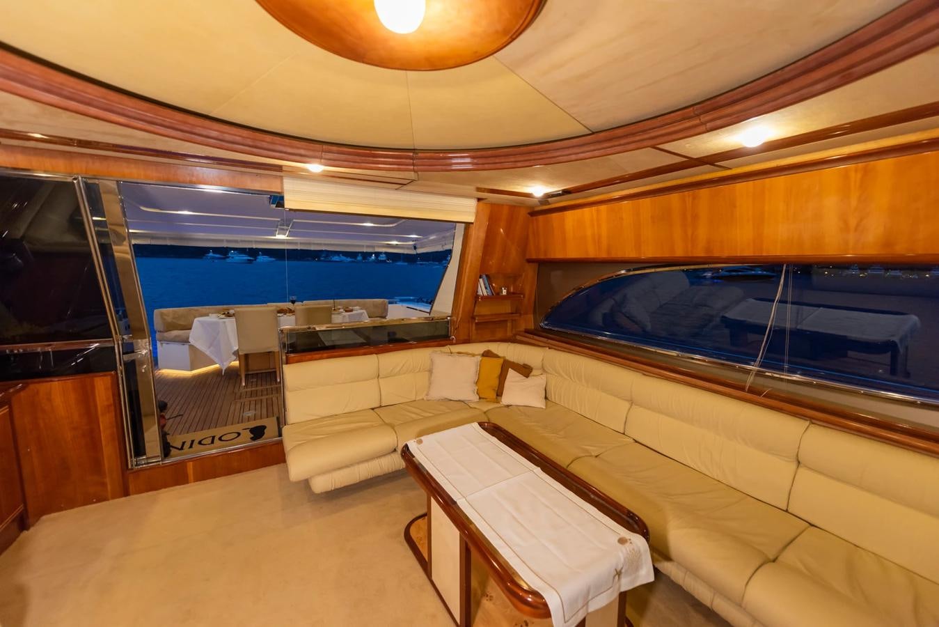 a room with a bed and a table aboard LOTUS Yacht for Sale
