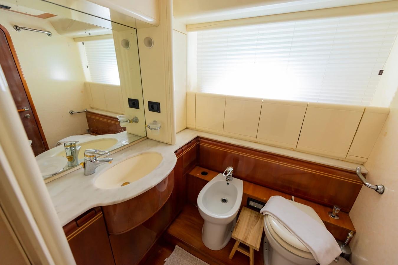 a bathroom with a toilet sink and a bathtub aboard LOTUS Yacht for Sale