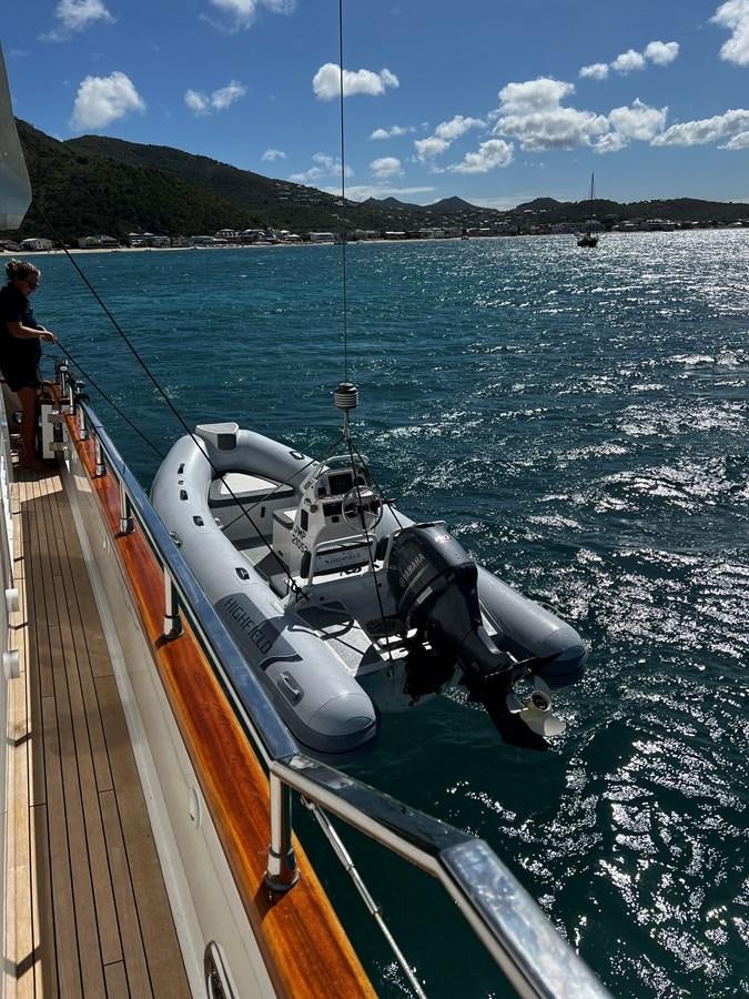 a boat with a motor attached to it aboard KOKO Yacht for Sale