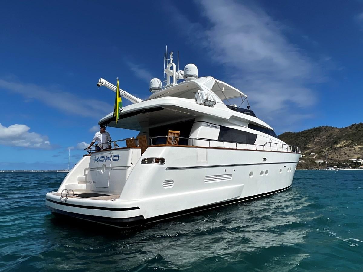 a white boat in the water aboard KOKO Yacht for Sale