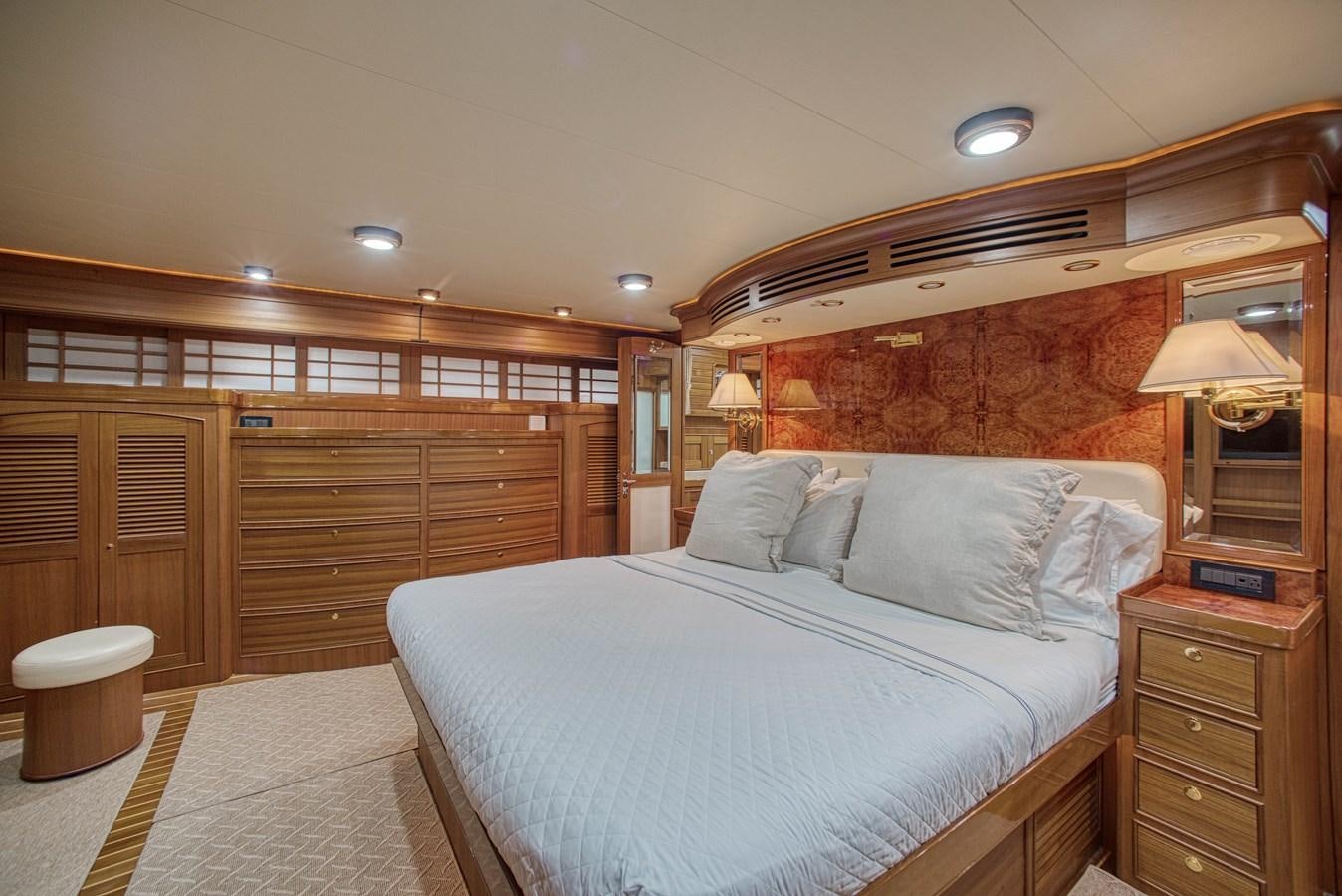 a large bedroom with a large bed aboard RODE RUNNER II Yacht for Sale