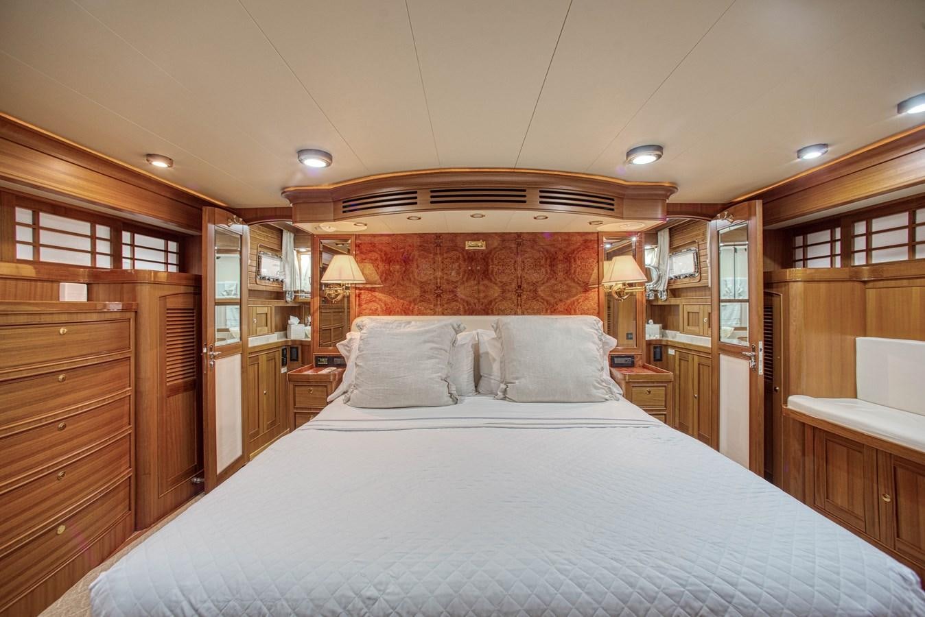 a large bed in a room aboard RODE RUNNER II Yacht for Sale