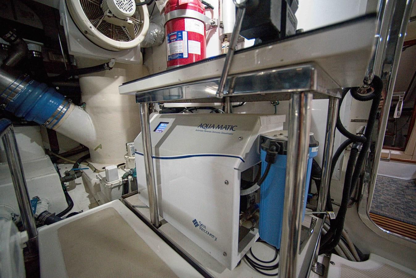 a machine with a blue tube aboard RODE RUNNER II Yacht for Sale