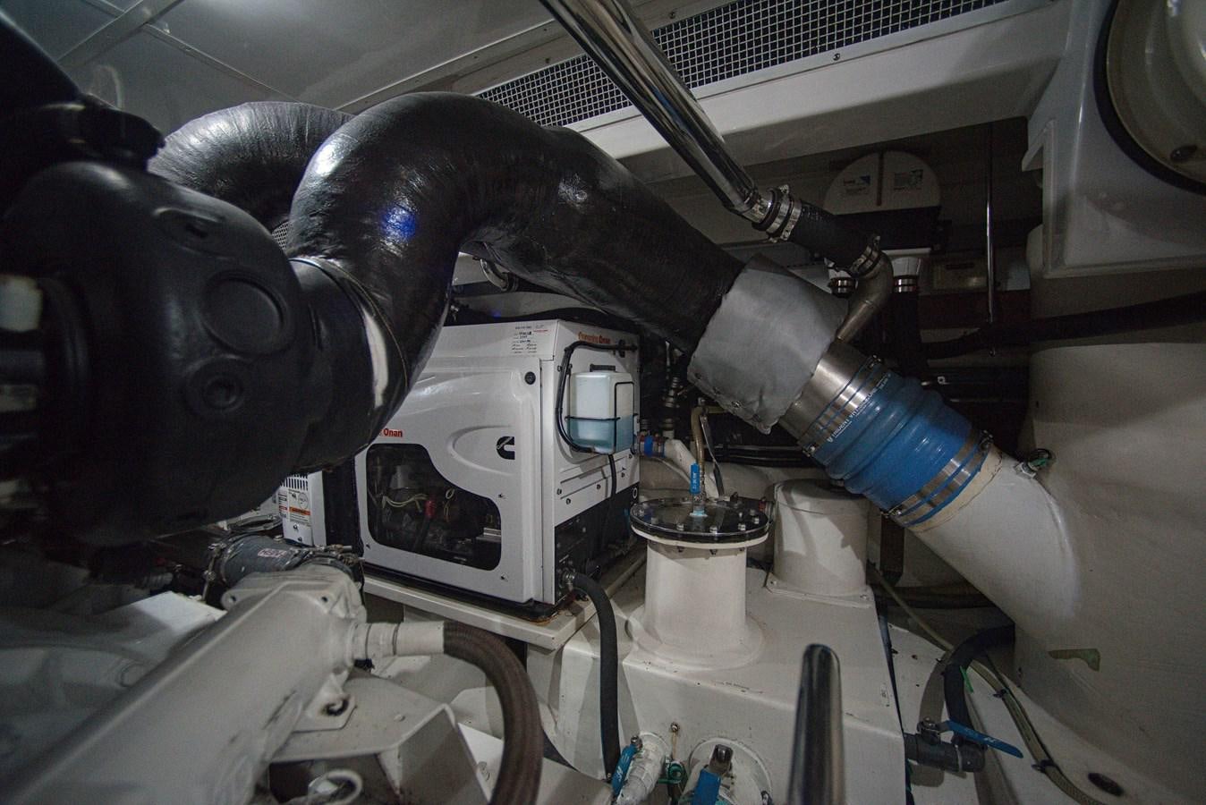 a machine with a large black pipe aboard RODE RUNNER II Yacht for Sale