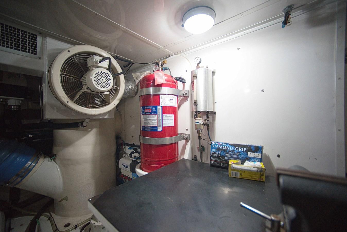 a large white machine aboard RODE RUNNER II Yacht for Sale