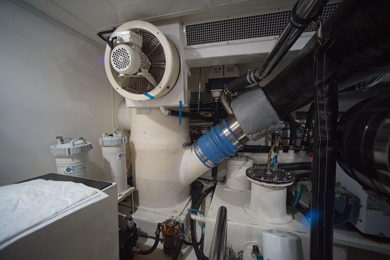 a machine with a large metal pipe aboard RODE RUNNER II Yacht for Sale