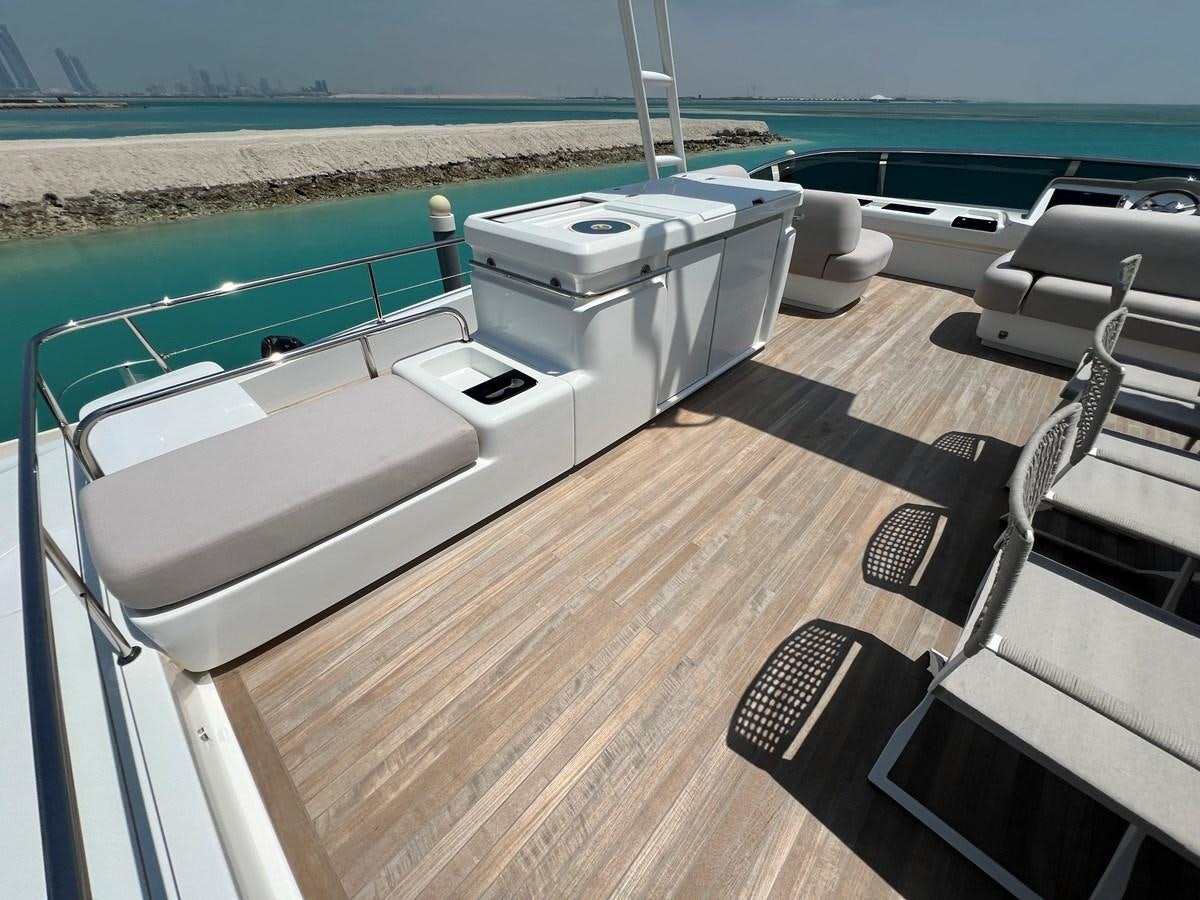 a deck with a pool and a deck with a deck and a deck aboard 2023 LAGOON 67 Yacht for Sale