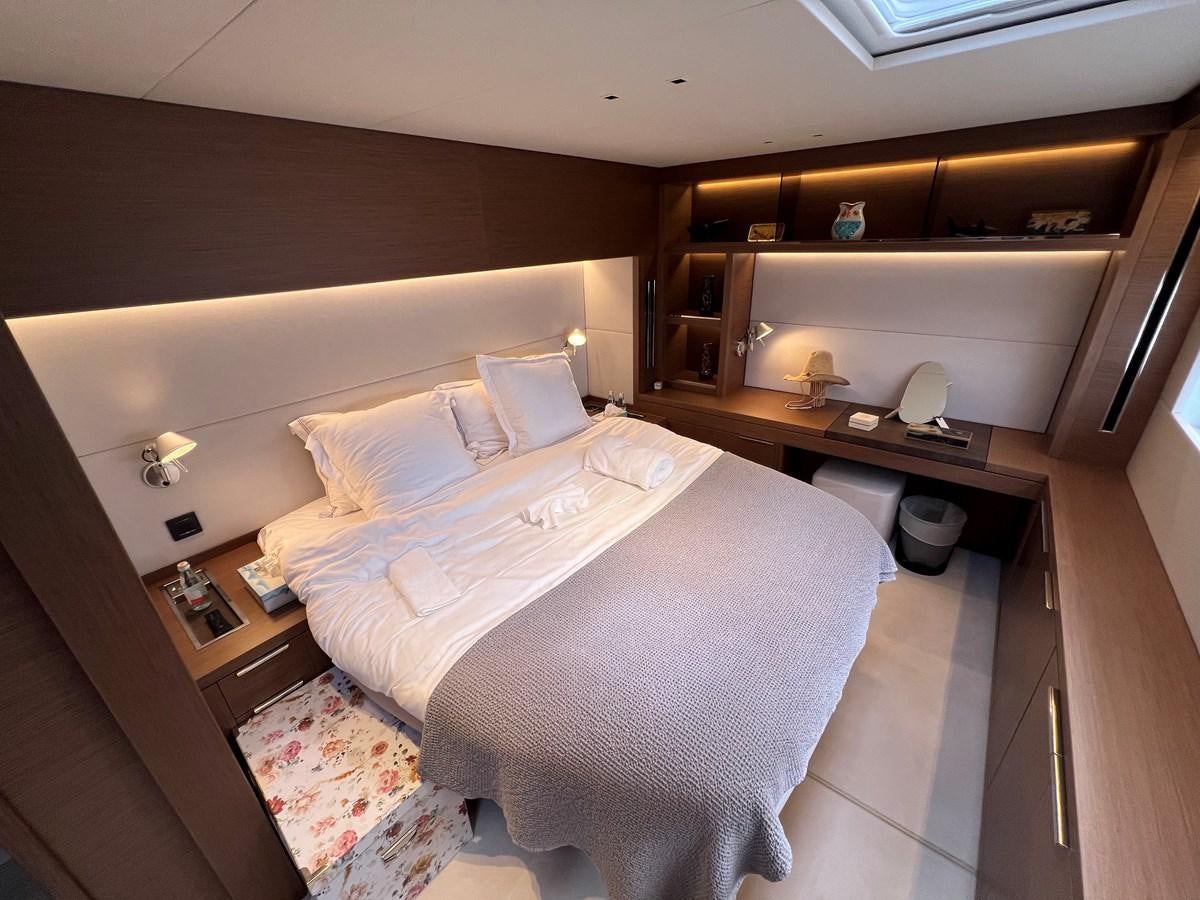 a hotel room with a bed aboard 2023 LAGOON 67 Yacht for Sale