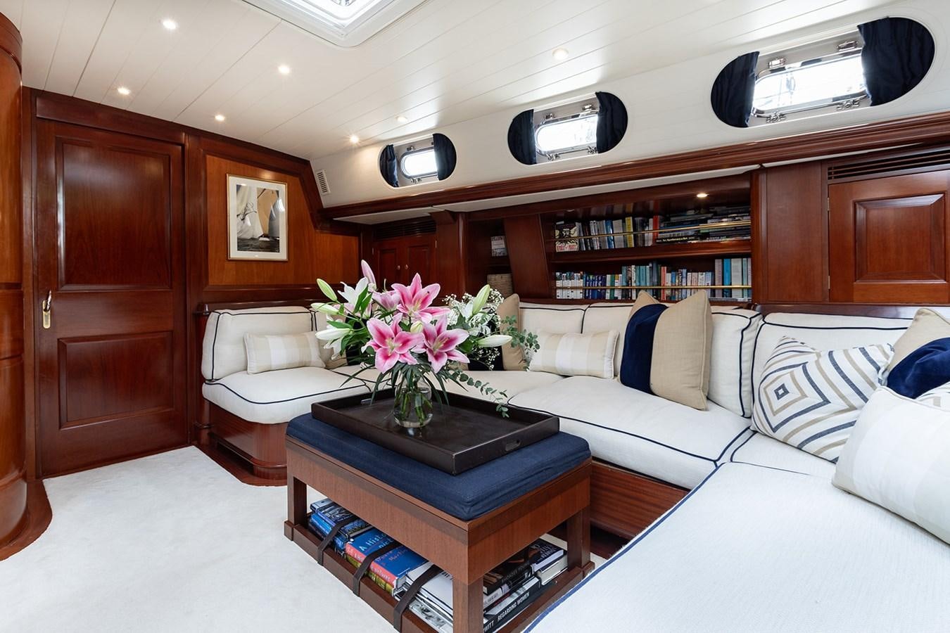 a room with a couch and a table aboard IRELANDA Yacht for Sale