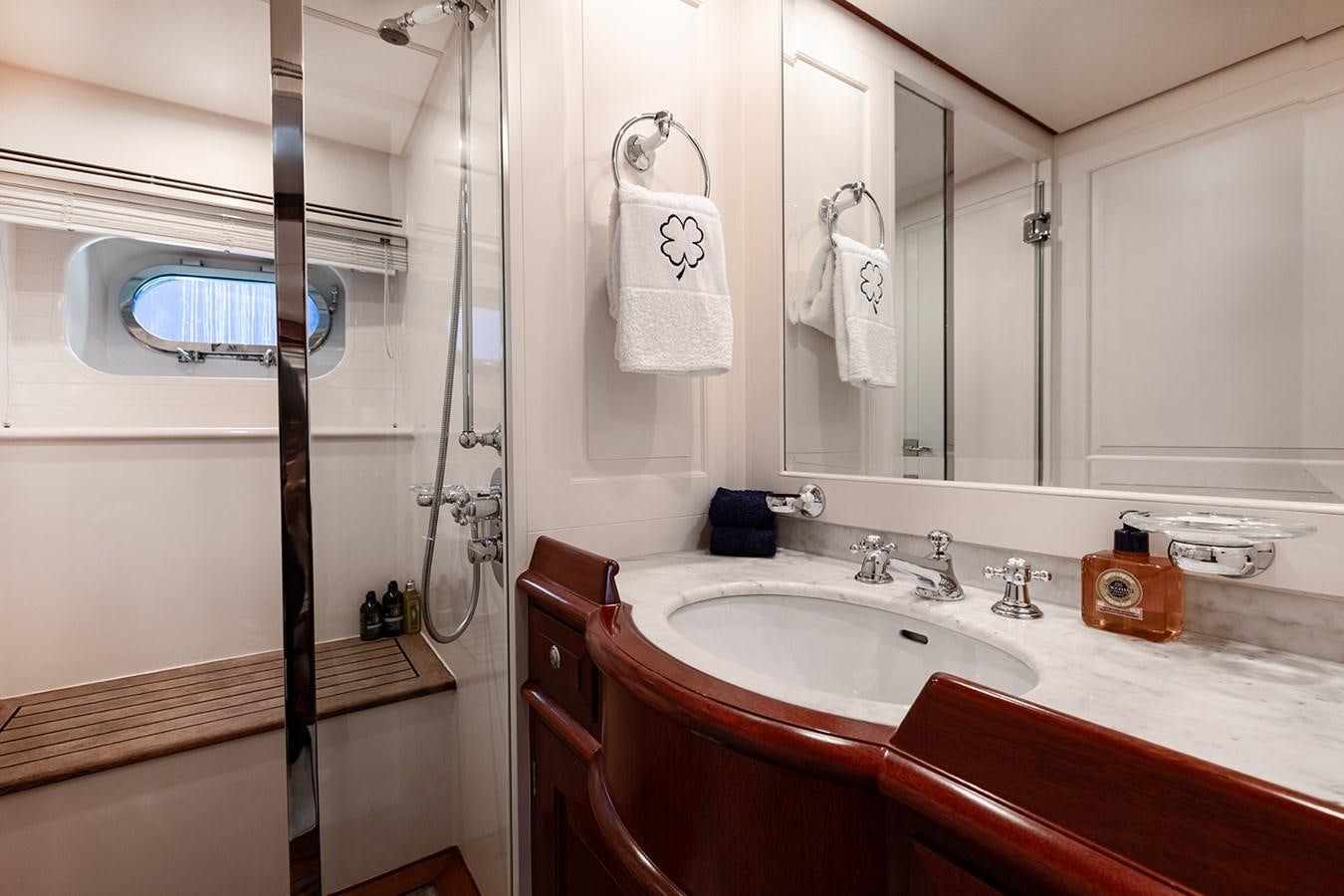 a bathroom with a sink and a mirror aboard IRELANDA Yacht for Sale