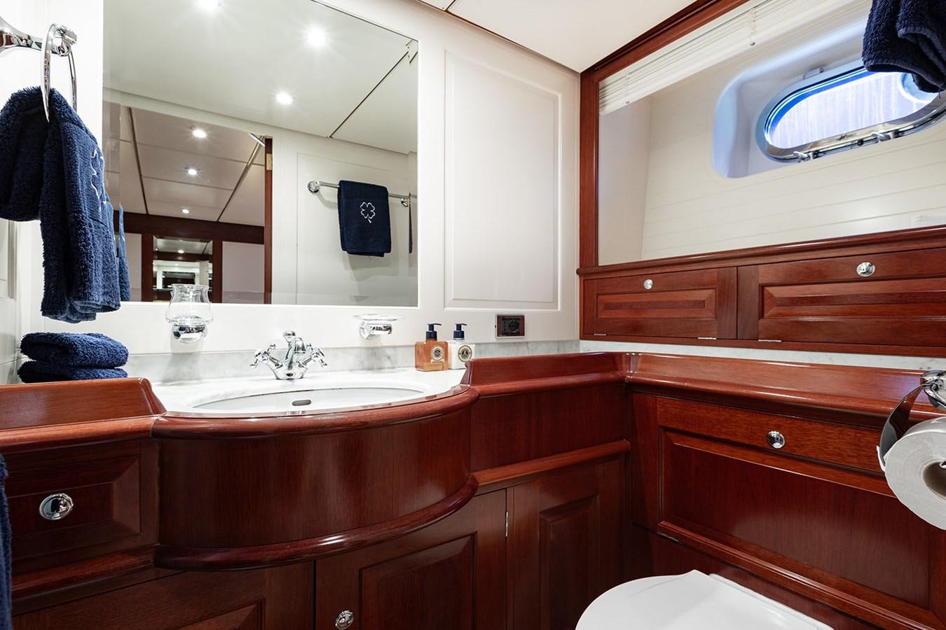 a bathroom with a sink and a mirror aboard IRELANDA Yacht for Sale