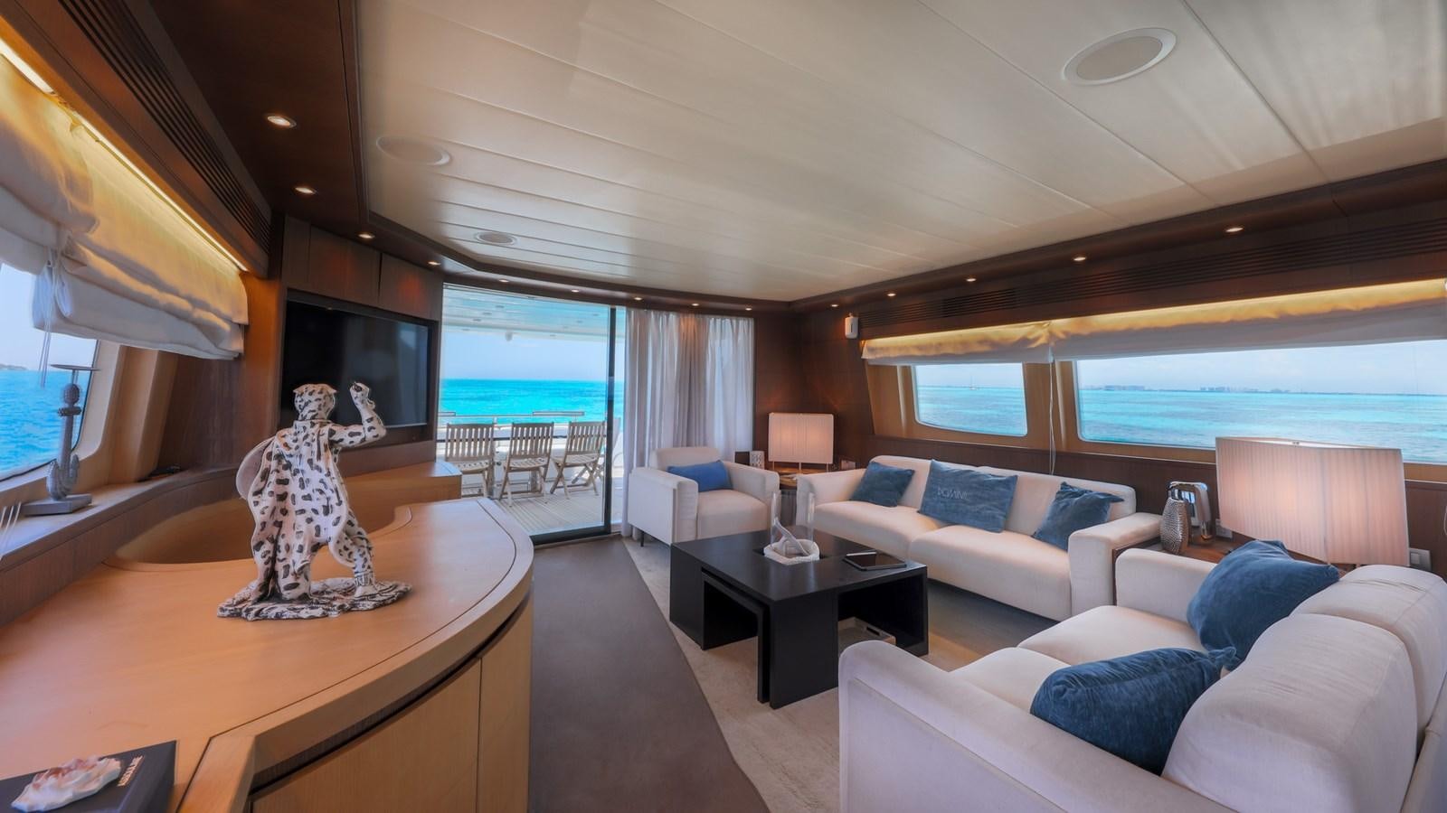 a living room with a large window aboard DOMINIC  2008 MAIORA 27M @ PUERTO AVENTURAS Yacht for Sale