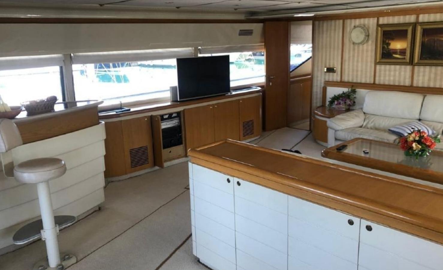 a kitchen with a large window aboard ORYX Yacht for Sale