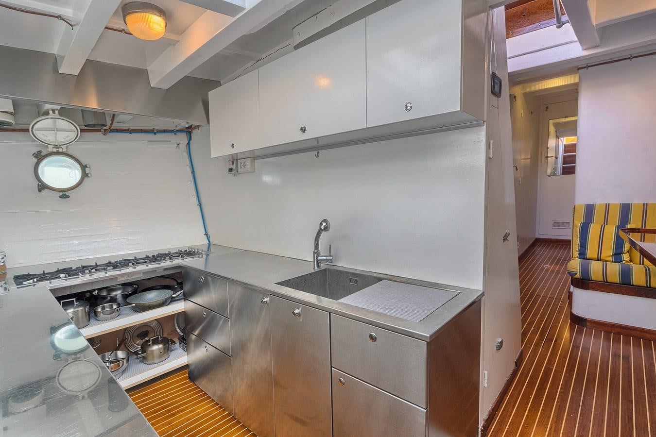 a kitchen with a sink and a stove aboard PHILMARBE - ORTIGOZA COFADIC Yacht for Sale