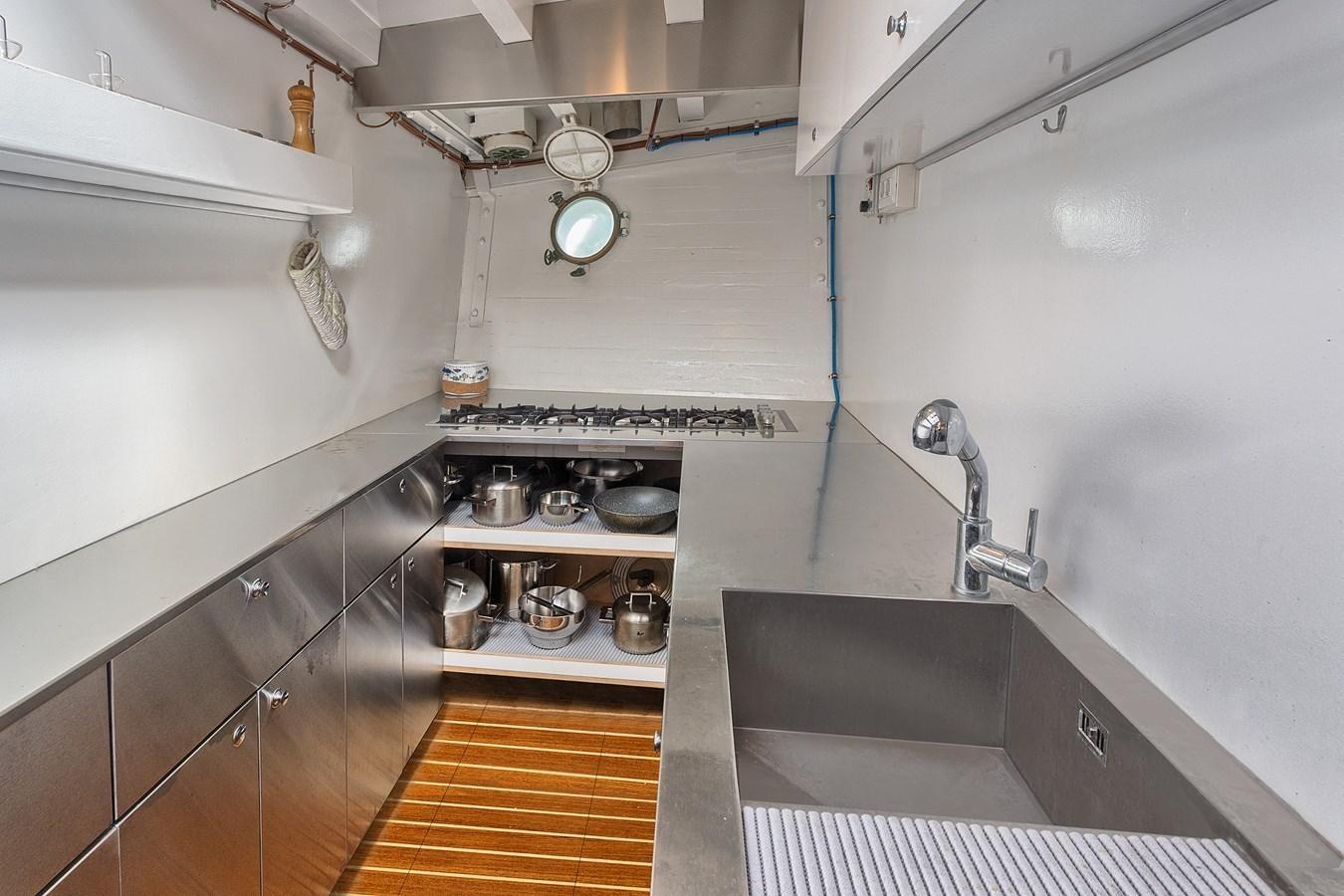 a kitchen with stainless steel appliances aboard PHILMARBE - ORTIGOZA COFADIC Yacht for Sale