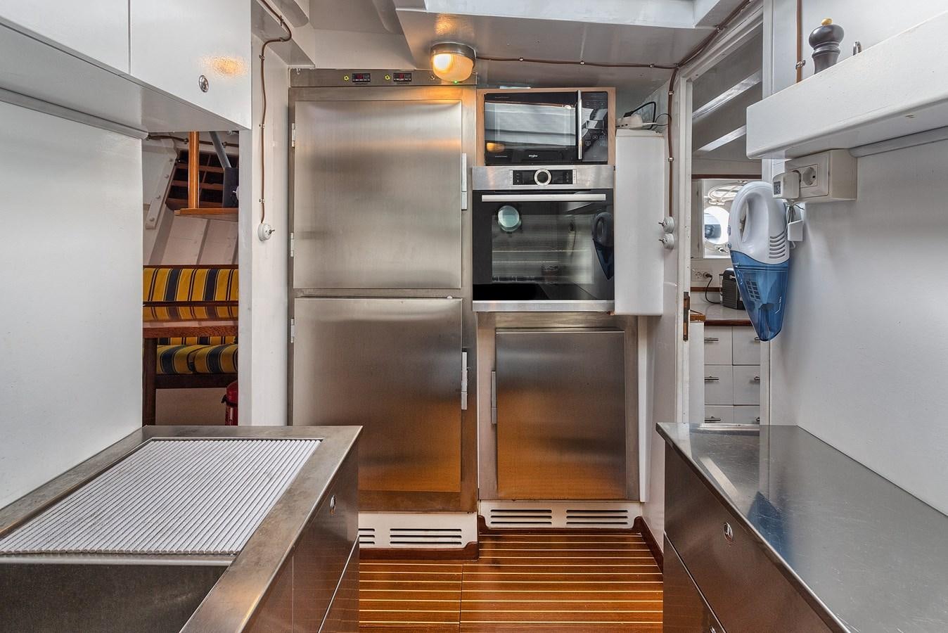 a large kitchen with stainless steel appliances aboard PHILMARBE - ORTIGOZA COFADIC Yacht for Sale
