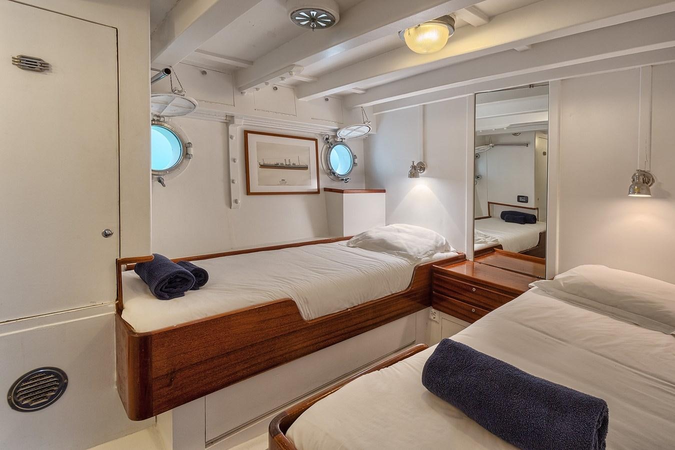 a room with two beds aboard PHILMARBE - ORTIGOZA COFADIC Yacht for Sale