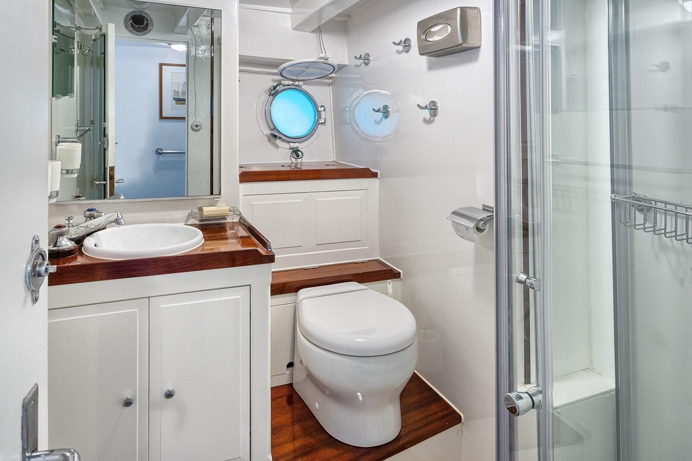 a bathroom with a sink toilet and a shower aboard PHILMARBE - ORTIGOZA COFADIC Yacht for Sale
