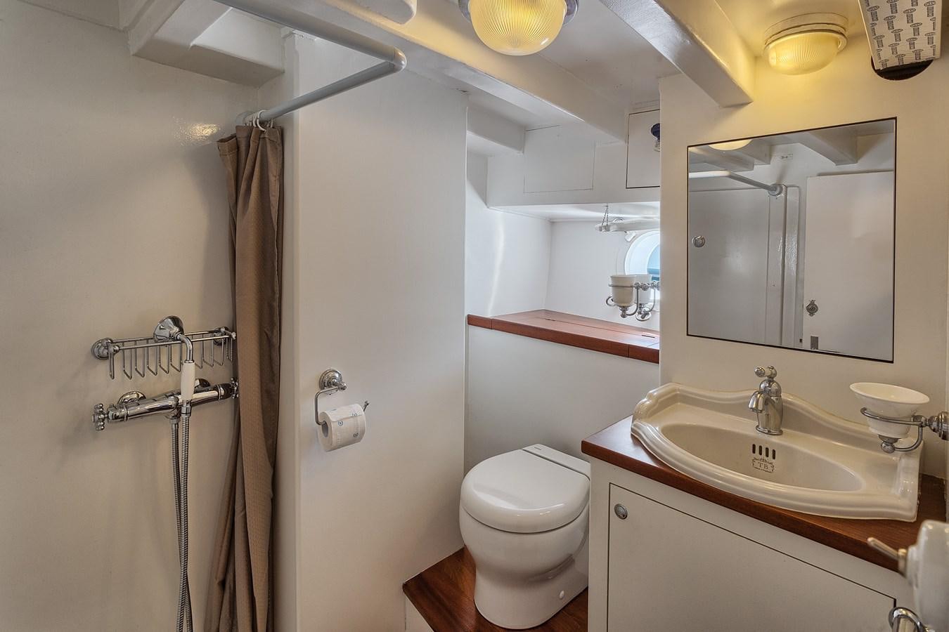 a bathroom with a sink and toilet aboard PHILMARBE - ORTIGOZA COFADIC Yacht for Sale