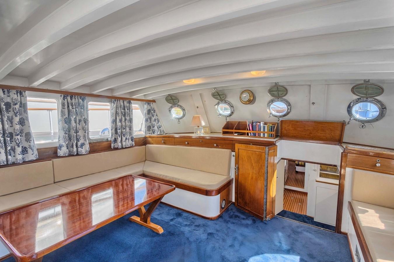a room with a blue carpet and a blue rug aboard PHILMARBE - ORTIGOZA COFADIC Yacht for Sale