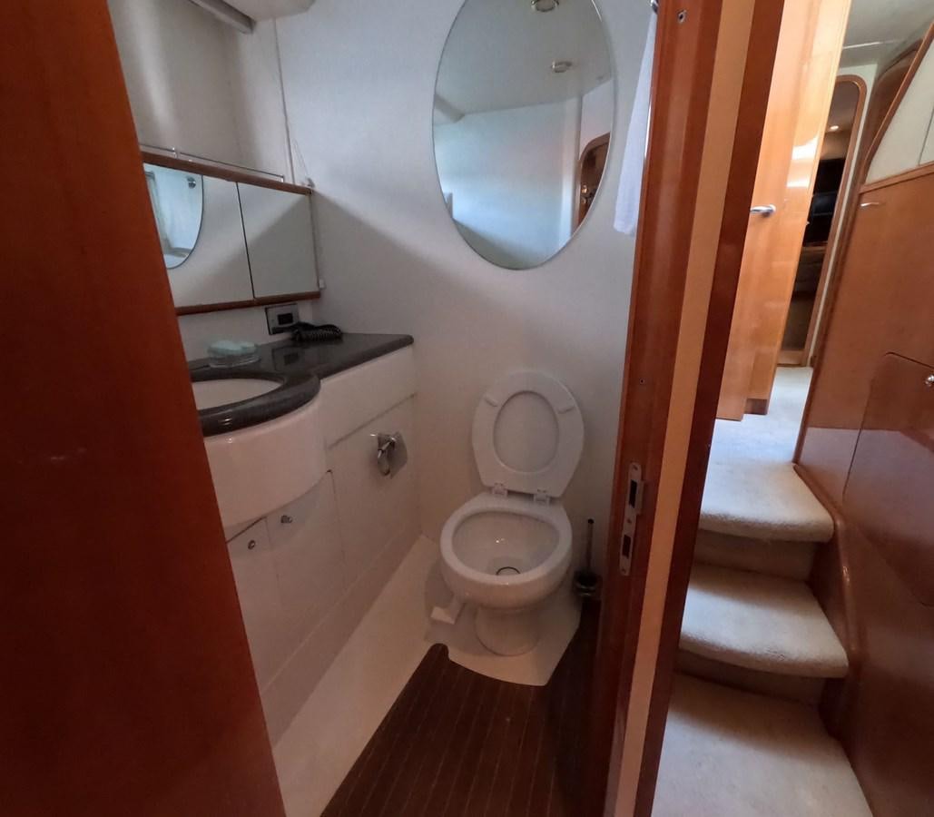 a bathroom with a toilet and sink aboard PYRAMID Yacht for Sale