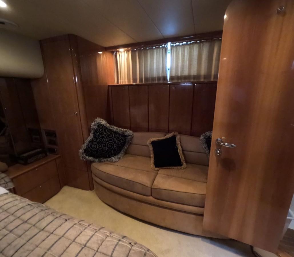 a room with a couch and a bed aboard PYRAMID Yacht for Sale