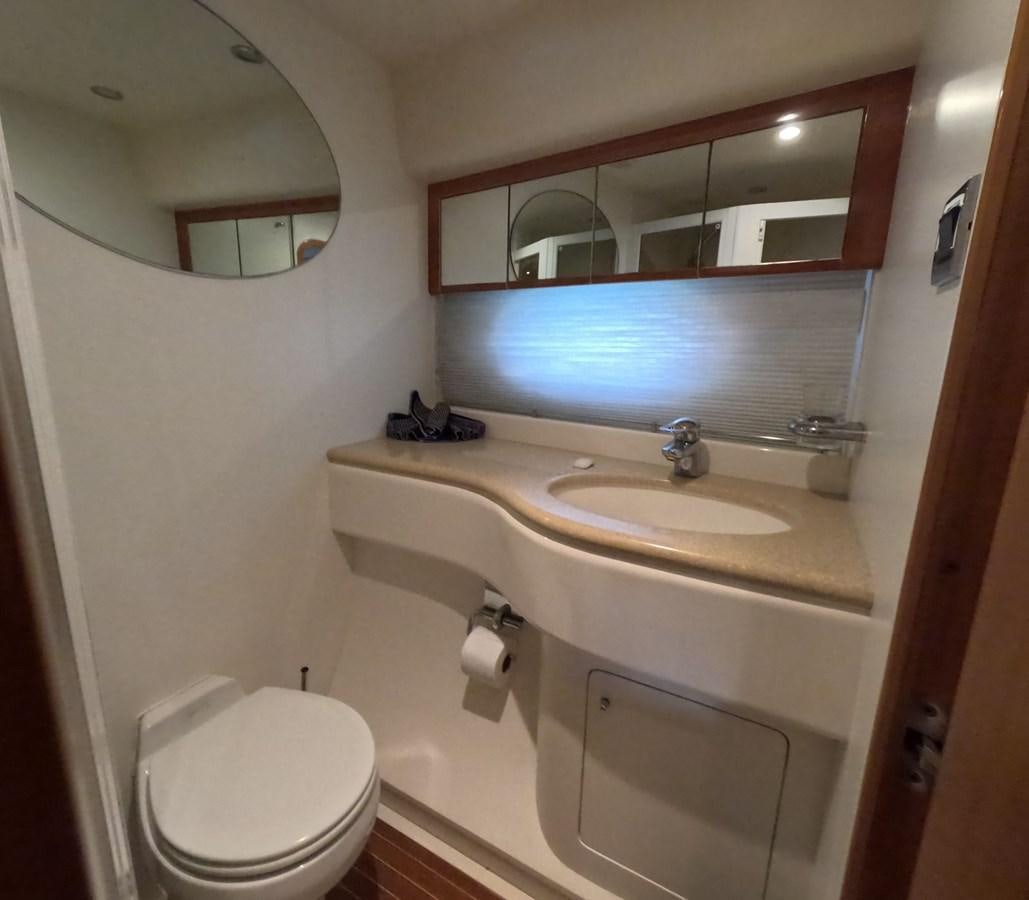 a bathroom with a large mirror aboard PYRAMID Yacht for Sale