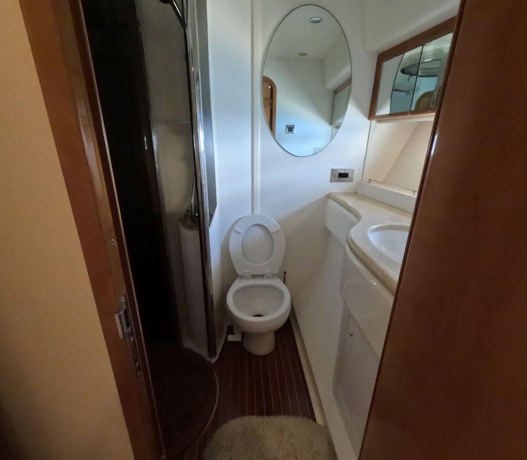 a bathroom with a toilet and sink aboard PYRAMID Yacht for Sale