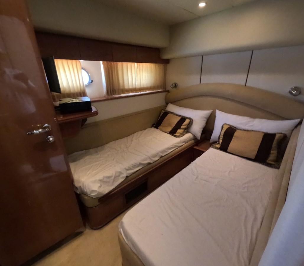 a room with two beds aboard PYRAMID Yacht for Sale
